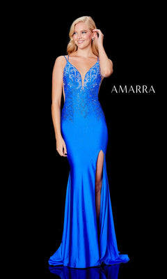 A woman wearing the Amarra Backless Long Jersey Prom Dress with Beads, a royal blue, floor-length mermaid gown featuring a thigh-high slit and beaded bodice detail, stands against a black background with "AMARRA" text.