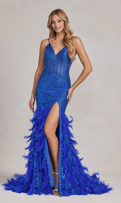 A woman stands against a neutral background wearing the Open-Back Shimmer Prom Dress with Feather Skirt, featuring a bright blue shimmer, feather skirt, and thigh-high slit.