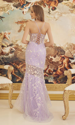 A woman in a lilac purple prom dress with sparkling floral print stands facing an ornate wall mural of classical art, framed by two gold-trimmed white chairs.