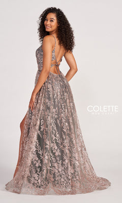 Woman wearing a sleeveless, floor-length Colette CL2022 Strappy A-Line Glitter Prom Dress with a slit, posing with her back partly to the camera; "Colette Mon Cheri" branding visible.