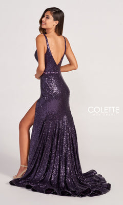 Woman in the Colette CL2041 Deep V-Neck Long Sequin Formal Gown with a high slit and open back, posing with her back to the camera—a glamorous pick for any formal or prom occasion.