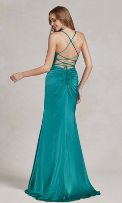 A woman wears the Cowl-Neck Classic Prom Dress with Side Slit, featuring teal satin fabric, ruched details, an open back with crisscross straps—an elegant choice for formal events—posed against a neutral background.