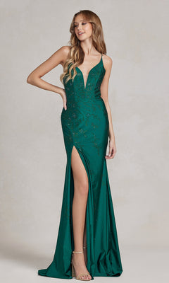 A woman poses against a plain light background in a backless prom dress with a floral beaded pattern, featuring a deep green color, sleeveless v-neck design, and high slit.