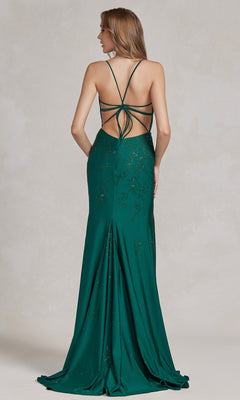 Woman in a green Backless Prom Dress with a floral beaded pattern and crisscross straps, floor-length with an open back, posed against a neutral background.
