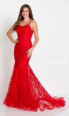 A woman poses in a fitted, floor-length bright red Long Lace Mermaid Prom Dress with a strappy back and lace embellishments, standing against a plain white background.