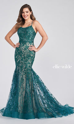 A woman models the Long Lace Mermaid Prom Dress with Strappy Back, featuring teal floral lace, thin straps, a fitted bodice, and a flared tulle skirt—showcasing the elegance of this open-back evening gown against a plain background.
