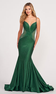 A woman wearing a fitted Sheer-Sides Beaded Stretch Mermaid Formal Dress in deep green with thin straps and geometric detailing, standing against a plain light background.