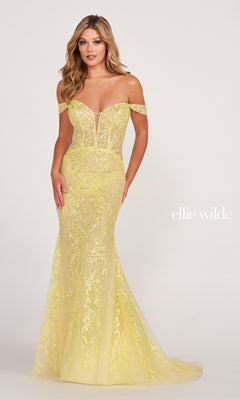 A woman stands against a plain light background in the Lace-Embroidered Off-Shoulder Long Mermaid Gown, featuring a fitted silhouette, floral lace embroidery, and an elegant off-the-shoulder neckline.