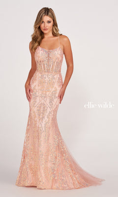 A woman in a fitted, floor-length pale pink Sheer-Corset Long Sequin Mermaid Prom Dress featuring intricate beading, thin straps, and an open back stands against a plain background. The text "ellie wilde" appears beside her.