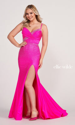 A woman smiles in a bright pink, fitted Ellie Wilde Beaded Long Cut-Out Prom Dress with glittering details and a high slit. "Ellie Wilde" appears on the image.