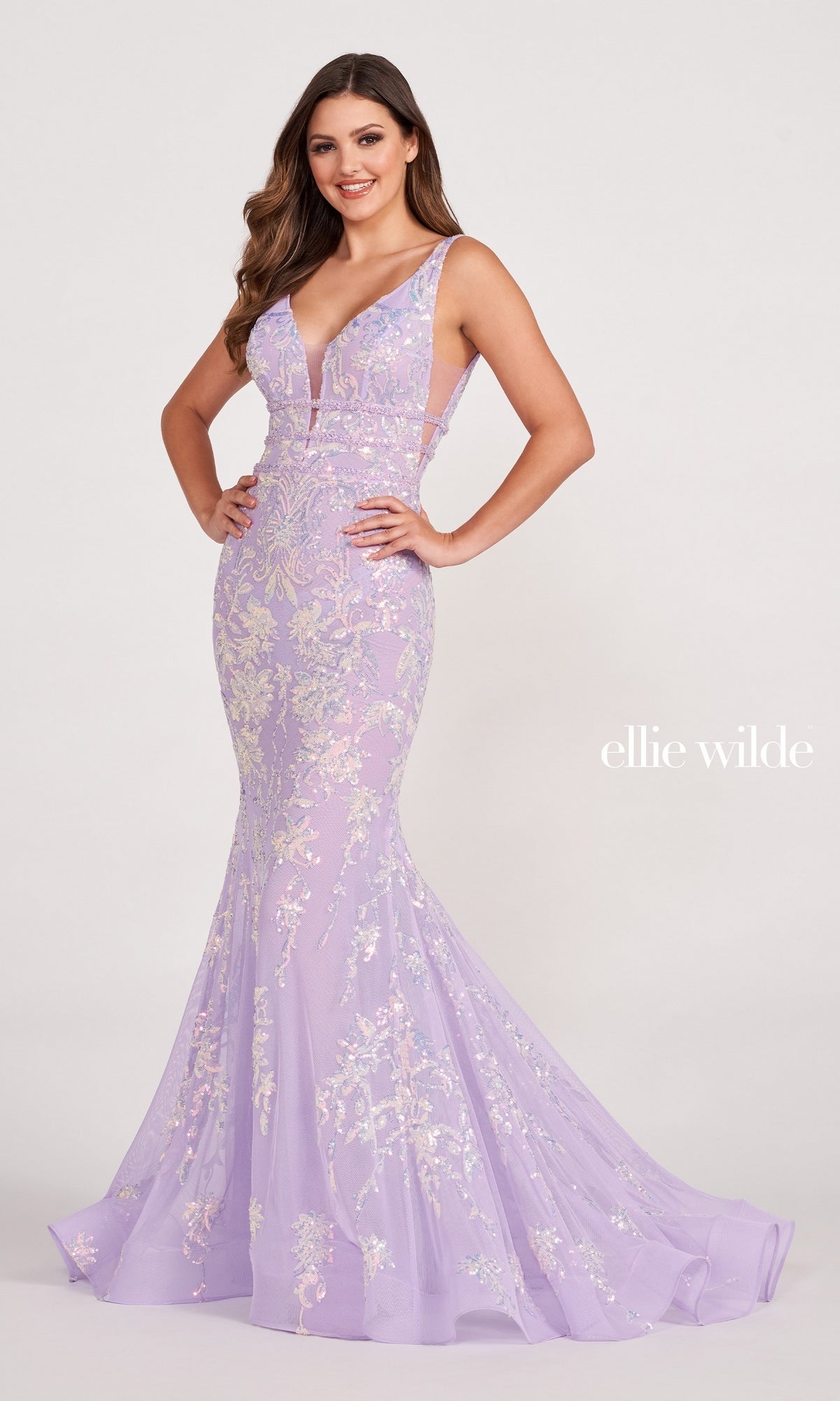 A woman models the Banded-Waist Long Sequin Mermaid Prom Dress—sleeveless, fitted, floor-length with a flared hem—posing against a plain background. 