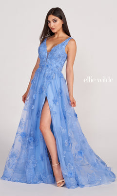 A woman models the Ellie Wilde Faux-Wrap Embroidered-Lace Prom Dress in light blue, featuring a sleeveless design, deep V neckline, high front slit, floral appliqué, and lace embroidery. The text "ellie wilde" appears beside her.