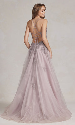 A woman stands with her back to the camera wearing the Open-Back Long Prom Ball Gown with Beads, a floor-length lavender tulle dress featuring beaded details, lace appliques, and a crisscross lace-up back.