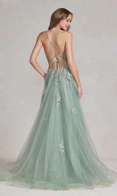 A woman in an Open-Back Long Prom Ball Gown with Beads, featuring light green fabric, floor-length a-line silhouette, beaded lace appliques, and a lace-up open back, stands facing away.