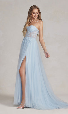 A woman stands against a plain background wearing the Corset-Bodice Long Pastel Prom Dress—a light blue evening gown with a strapless, sheer-lace corset bodice and high slit.