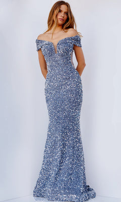 A woman models the Jovani Sequin Off-the-Shoulder Prom Dress, a stunning fitted gown adorned with blue sequins—perfect for any special occasion.