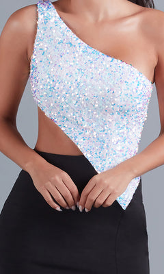 A woman models the PromGirl Black and White Long Prom Dress, featuring a white one-shoulder sequined top with an asymmetrical cut and a sleek black skirt for an elegant modern look.