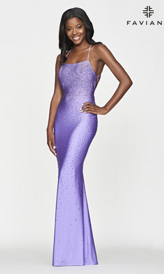 Woman in a figure-hugging Statement-Back Jeweled Long Faviana Prom Dress, featuring thin straps and subtle embellishments, poses against a plain white background.
