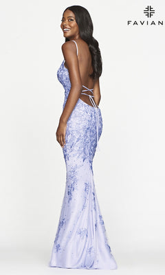 A woman poses against a plain white background in the Faviana Lace Embroidery Long Backless Prom Dress, featuring delicate lace details and thin straps, with the "FAVIAN" logo in the top right corner.