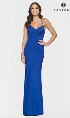 Woman wearing a sleeveless, floor-length Faviana Long Lace-Up-Back Prom Dress in hot pink with thin straps, fitted silhouette, and wrap-style bodice. Faviana logo in upper right corner.