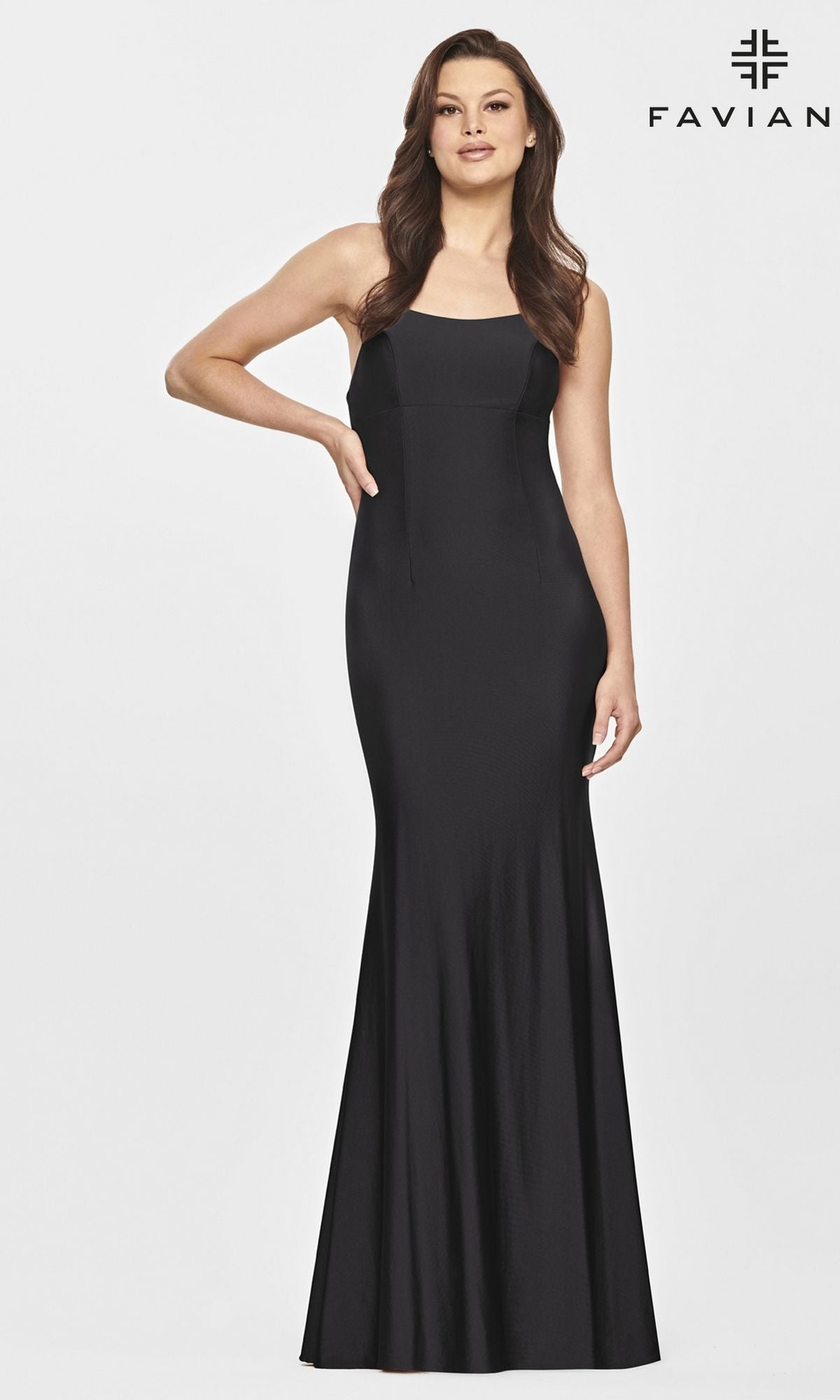 A woman wears the Faviana Open-Back Simple Long Black Formal Dress—sleeveless, floor-length with a fitted bodice and flared skirt; “Faviana” logo appears in the top right corner.