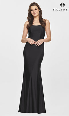 A woman stands and smiles in the Faviana Open-Back Simple Long Black Formal Dress against a plain white background, with the Faviana logo in the top right corner.