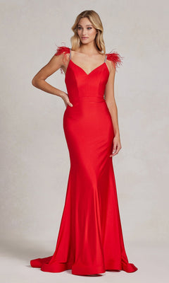 A woman stands against a light background wearing the Feather-Embellished Backless Long Prom Dress, featuring a floor-length fitted silhouette and feather details on the shoulder straps.