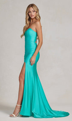 A woman poses elegantly in the Tight Long Sweetheart Strapless Formal Dress T1139, showcasing its turquoise hue, thigh-high slit, and long train against a neutral background.