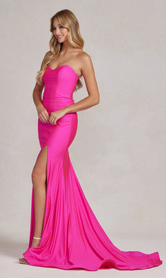 A woman wearing the Tight Long Sweetheart Strapless Formal Dress T1139 in fuchsia, with a thigh-high slit and floor-length train, stands against a plain light background.