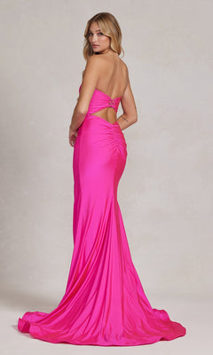 Woman wearing the Tight Long Sweetheart Strapless Formal Dress T1139 in hot pink, featuring a ruched back detail and long train, standing and looking over her shoulder.