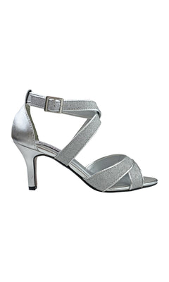 Amber Silver Prom Shoes by Touch Ups (54716) feature glittery silver crisscross straps, an ankle buckle, and a 2.75" heel—ideal for prom. Shown on a white background.