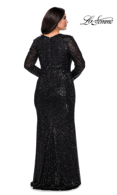 A woman faces away in a Sequin Plus-Size Long Sleeve La Femme Prom Dress, floor-length and black, on a white background with the "La Femme" logo at the top right.
