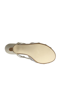 Bottom view of the Clara Champagne 1.75in Heel Prom Shoes 4487 by Touch Ups showing a smooth, light-colored sole with a small textured area near the heel—ideal for prom and elegant occasions.
