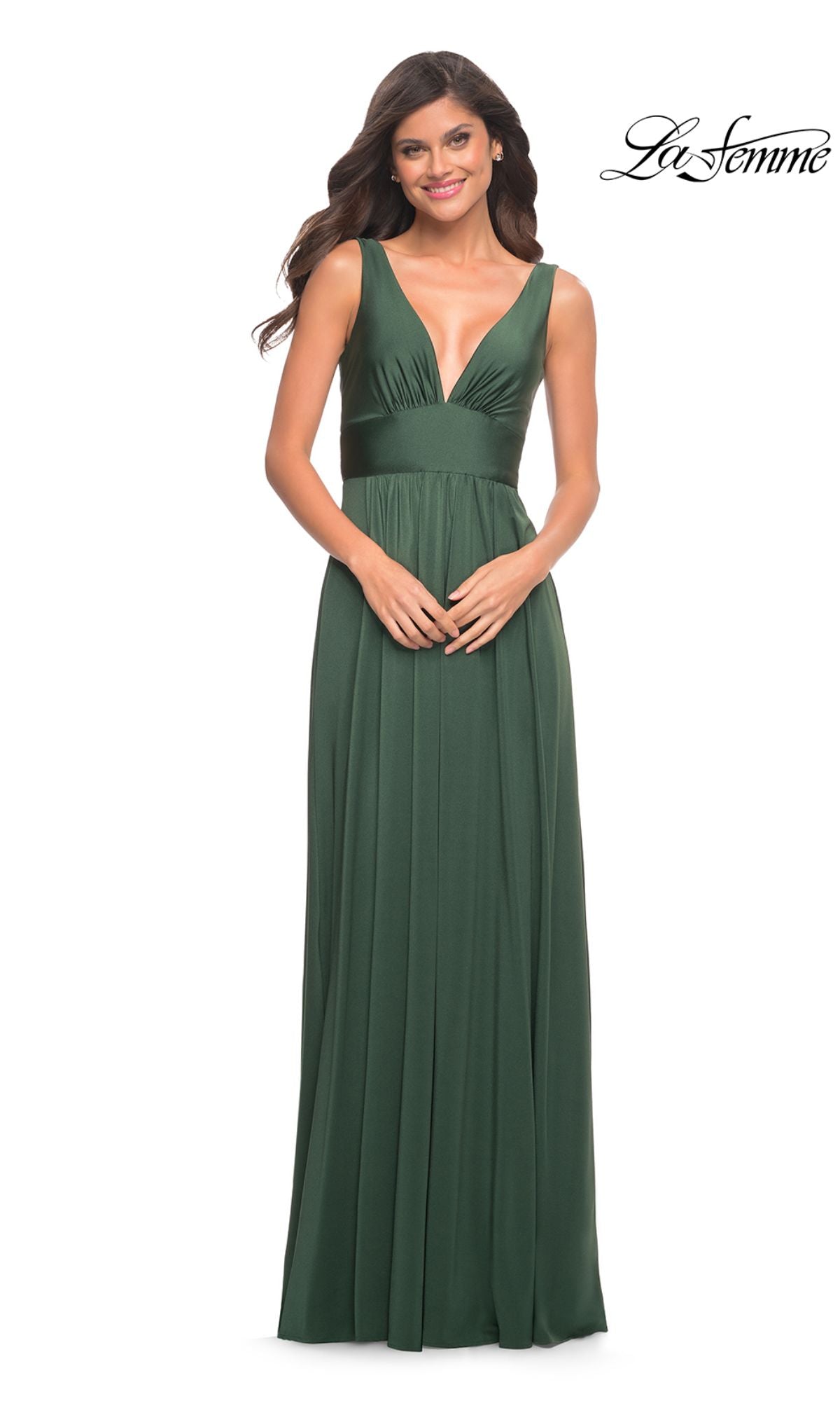 A woman in the La Femme Simple Long A-Line Formal Dress, featuring a sleeveless design and deep V-neckline in dark green, stands against a white background. The La Femme logo is visible in the top right corner.