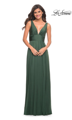 A woman in the La Femme Simple Long A-Line Formal Dress, featuring a sleeveless design and deep V-neckline in dark green, stands against a white background. The La Femme logo is visible in the top right corner.