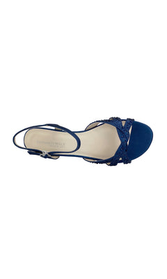 A top view of the Lena Navy Blue Wedge Prom Shoes (Touch Ups 4378), crafted from vegan leather with decorative straps and a slingback design, shown against a white background.