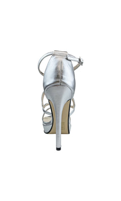Rear view of the Silver Lennox Platform Sandal by Touch Ups 4460 with an ankle strap and 4in stiletto heel, elegantly displayed against a white background.