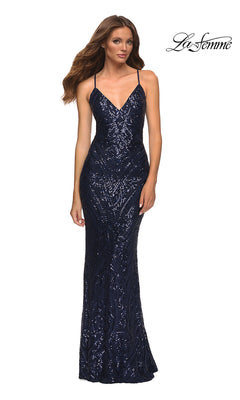 A woman models the Sequin-Print Long La Femme V-Neck Prom Dress, a navy blue floor-length gown with thin straps, sparkling sequins, and a flattering silhouette—ideal for making a bold statement at special occasions.