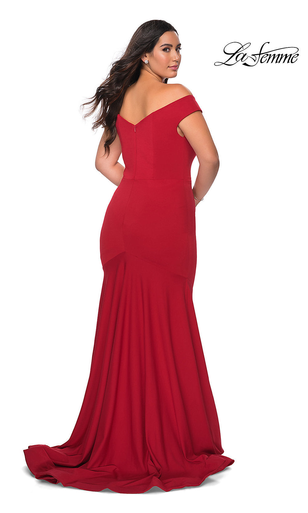 A woman stands with her back to the camera in a red La Femme Off-Shoulder Long Plus-Size Formal Dress, featuring a floor-length design with a slight train. 