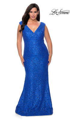 A woman models the Empire-Waist Long Plus-Size Prom Dress by La Femme—a royal blue, floor-length sequin-lace gown with a V-neckline—posing against a white background. The "La Femme" logo appears in the top right corner.