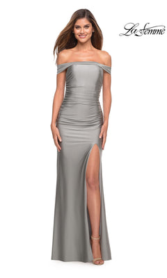 A woman stands and smiles in the La Femme Off-the-Shoulder Long Silver Prom Dress, featuring a glamorous thigh-high slit. The La Femme logo is in the top right corner.
